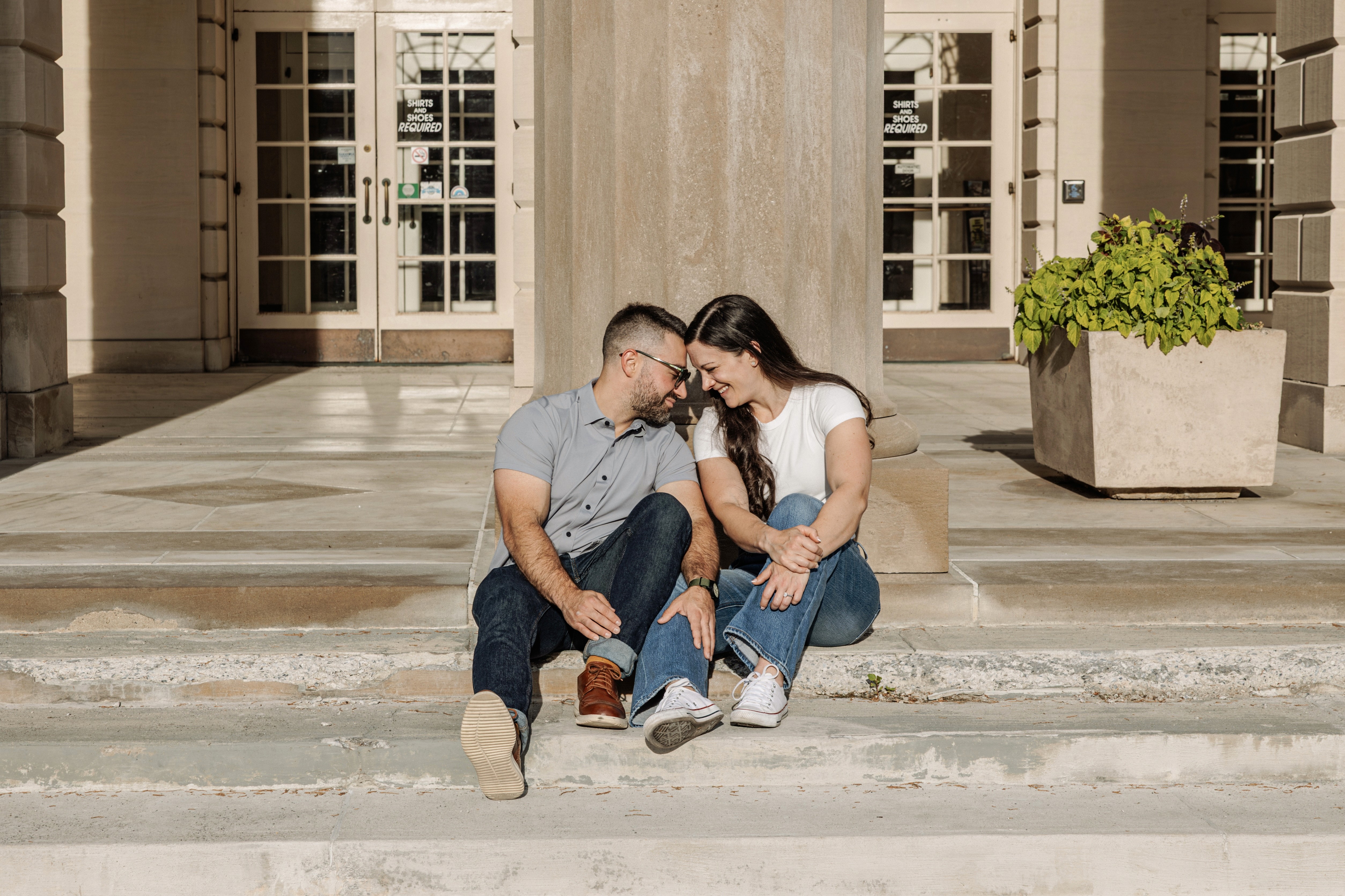 5:16 PMContent creator couple grinning from ear to ear, cheersing with hotdogs at the Mall in Central Park, NYC — fun, playful lifestyle and content creator photography by Lizz Spano Photography, New York City lifestyle photographer.