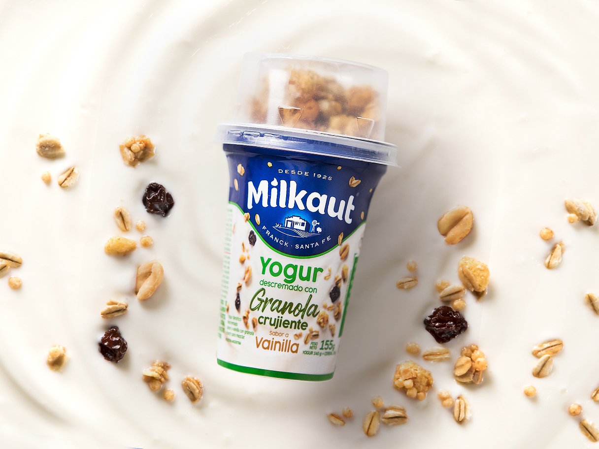 Rooftops of a coastal town with the sea in background