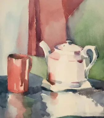 A painted teapot beside a red cup on a table, with soft, colorful backgrounds creating a warm atmosphere.