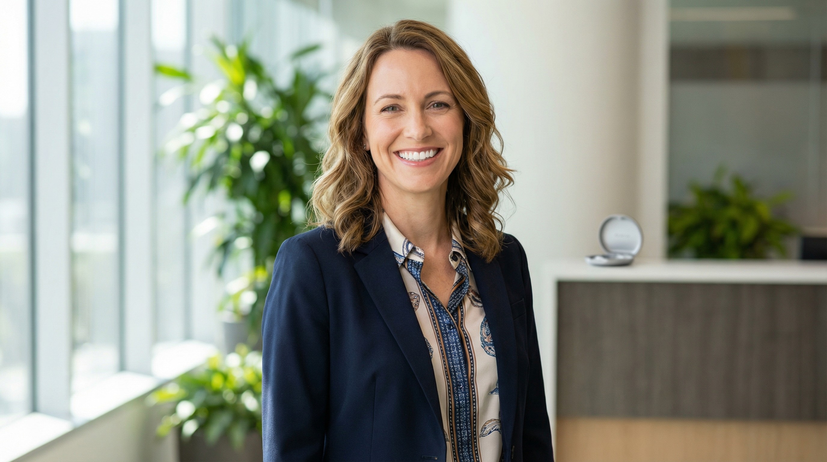 Adult patient displaying successful Invisalign treatment results with beautifully straight teeth and confident professional smile
