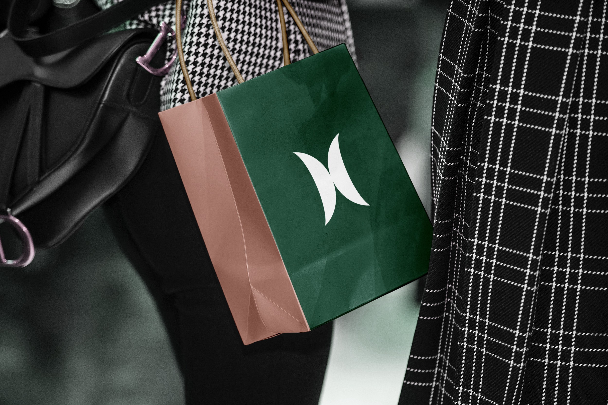 A cute 3D fuzzy burger with a pink sprinkled top bun, soft textured cheese, and plush burger patties, designed in a playful pastel aesthetic on a light gray background.