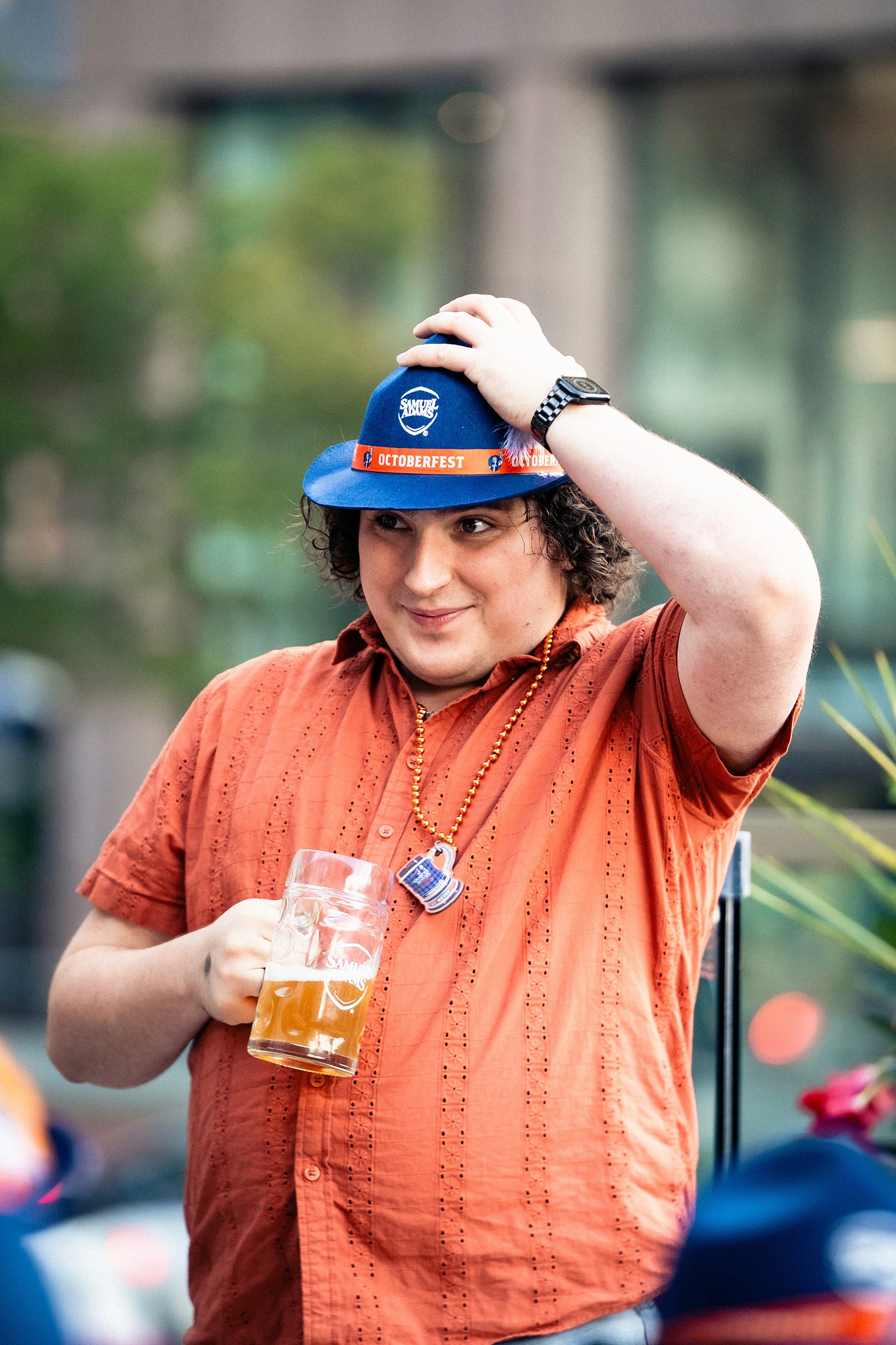 Guy with Sam Adams hat and beer
