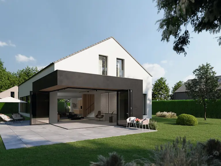 A serene outdoor seating area with two chairs, surrounded by lush greenery and a glassed-in structure.