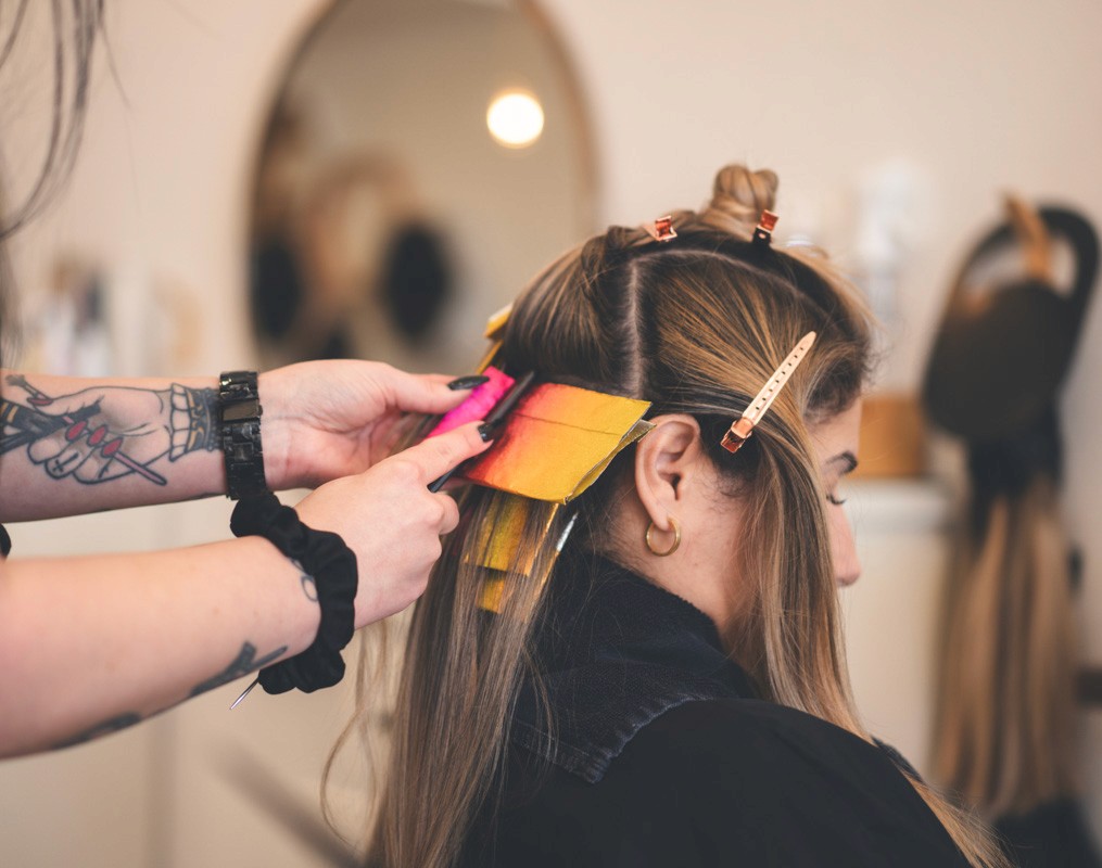 Hair color application at Del Sol Hair Studio Huntington Beach