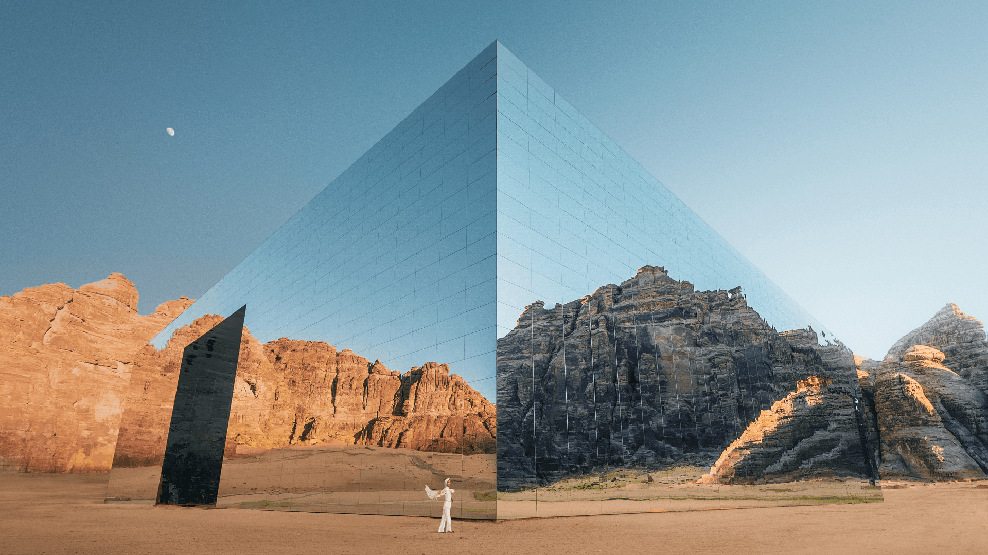Scenic Saudi desert landscape with rock formations and a modern architectural structure | Lunasole Hospitality