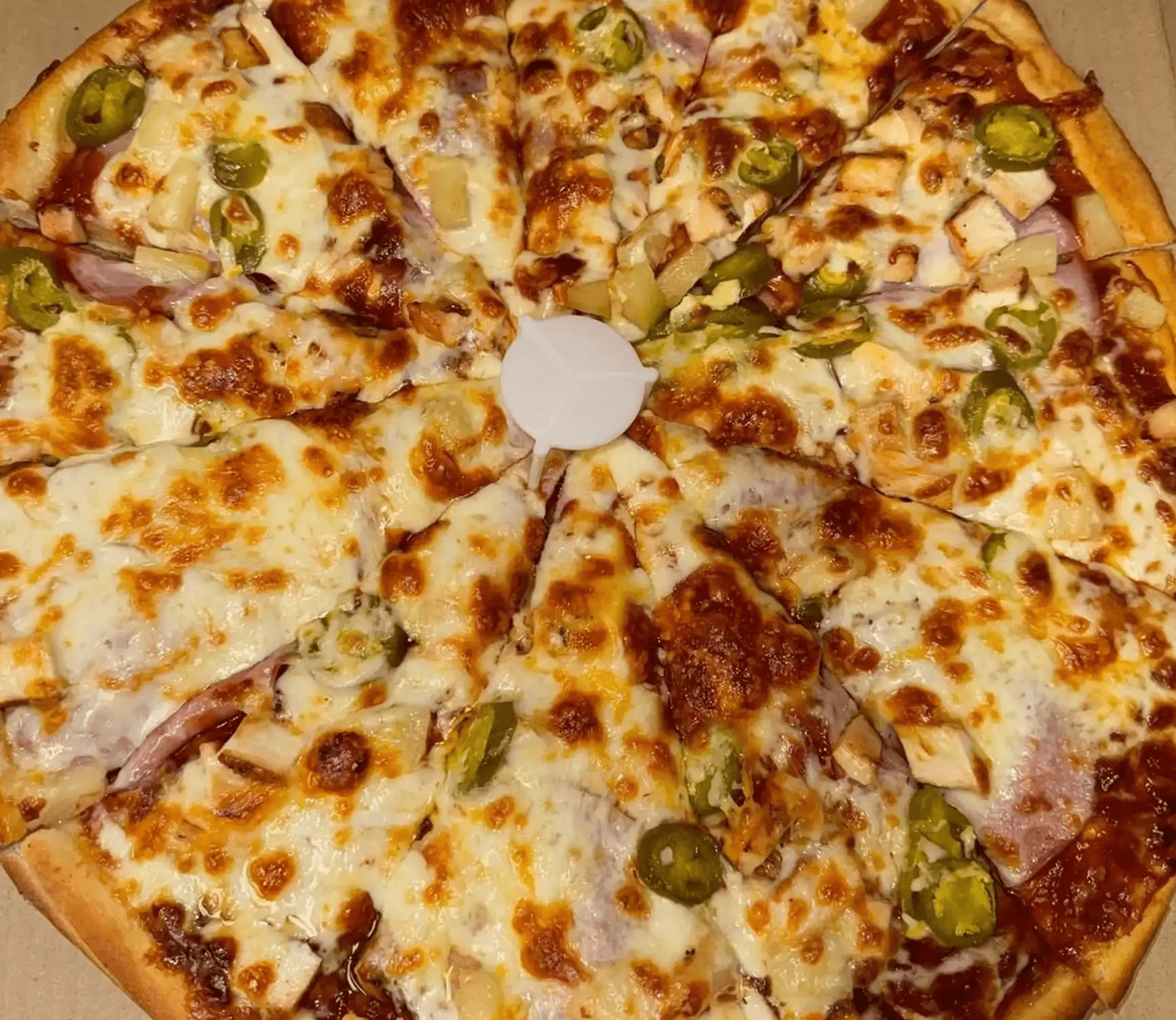 NEW SLOTH : BBQ Sauce, Chicken Breast, Canadian Bacon, Jalapeños, and Pineapple!