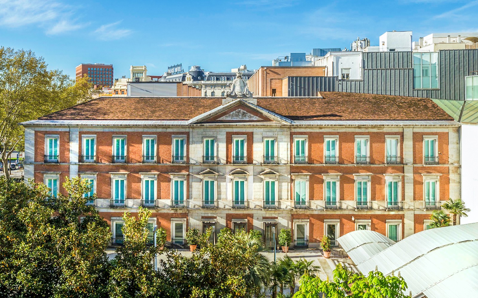 Exterior view of the Thyssen Museum in Madrid, showcasing its classic architecture.