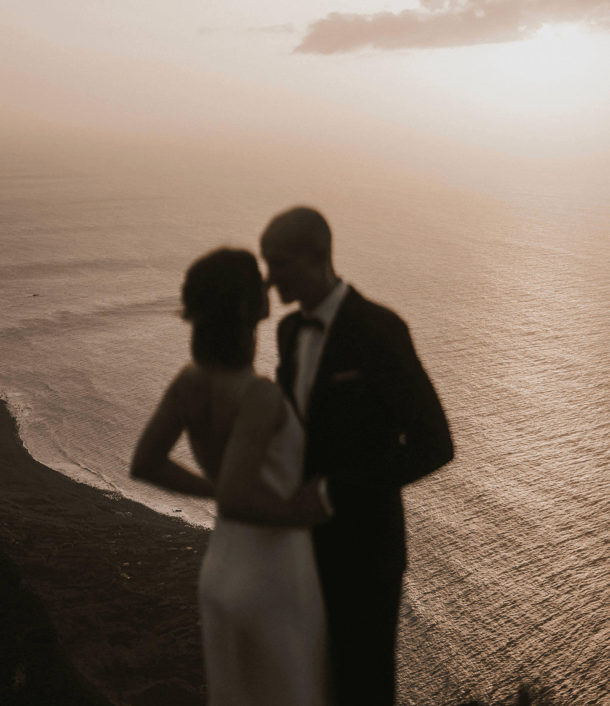 Madeira Elopement couple at sunset with Atlantic ocean coastline