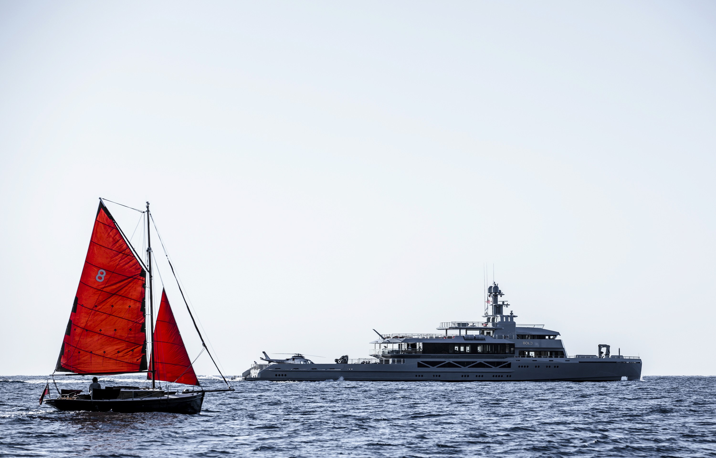 Warm modern orange living room with sofa, lamp.