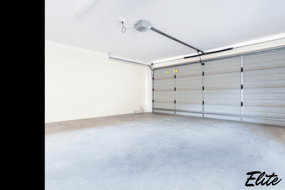 Clean residential garage featuring a LiftMaster opener serviced by Elite Garage Door.
