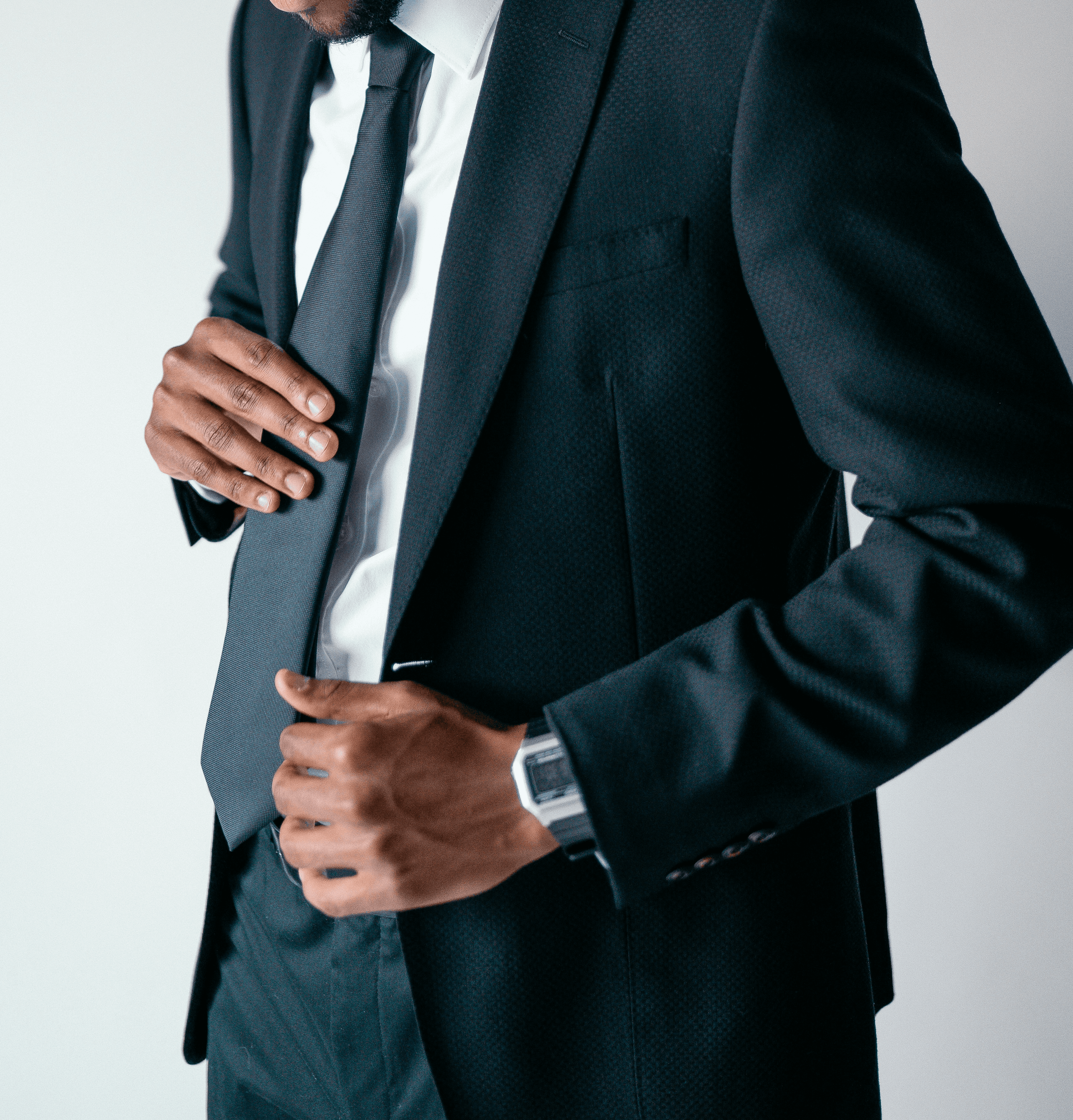 A professionally dressed individual in a dark suit, representing LifeLinc leadership team growth and new executive additions