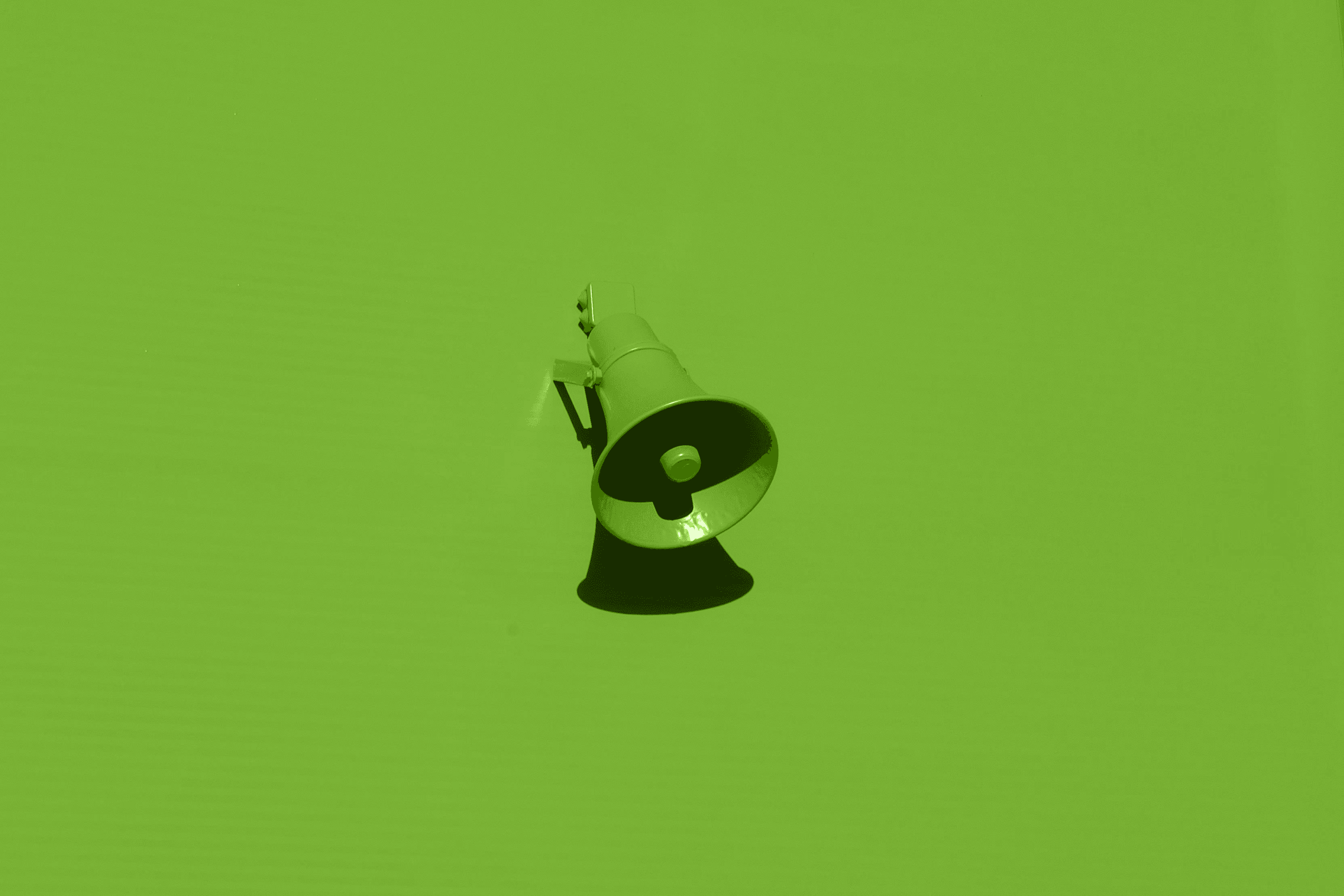 orange megaphone on orange wall