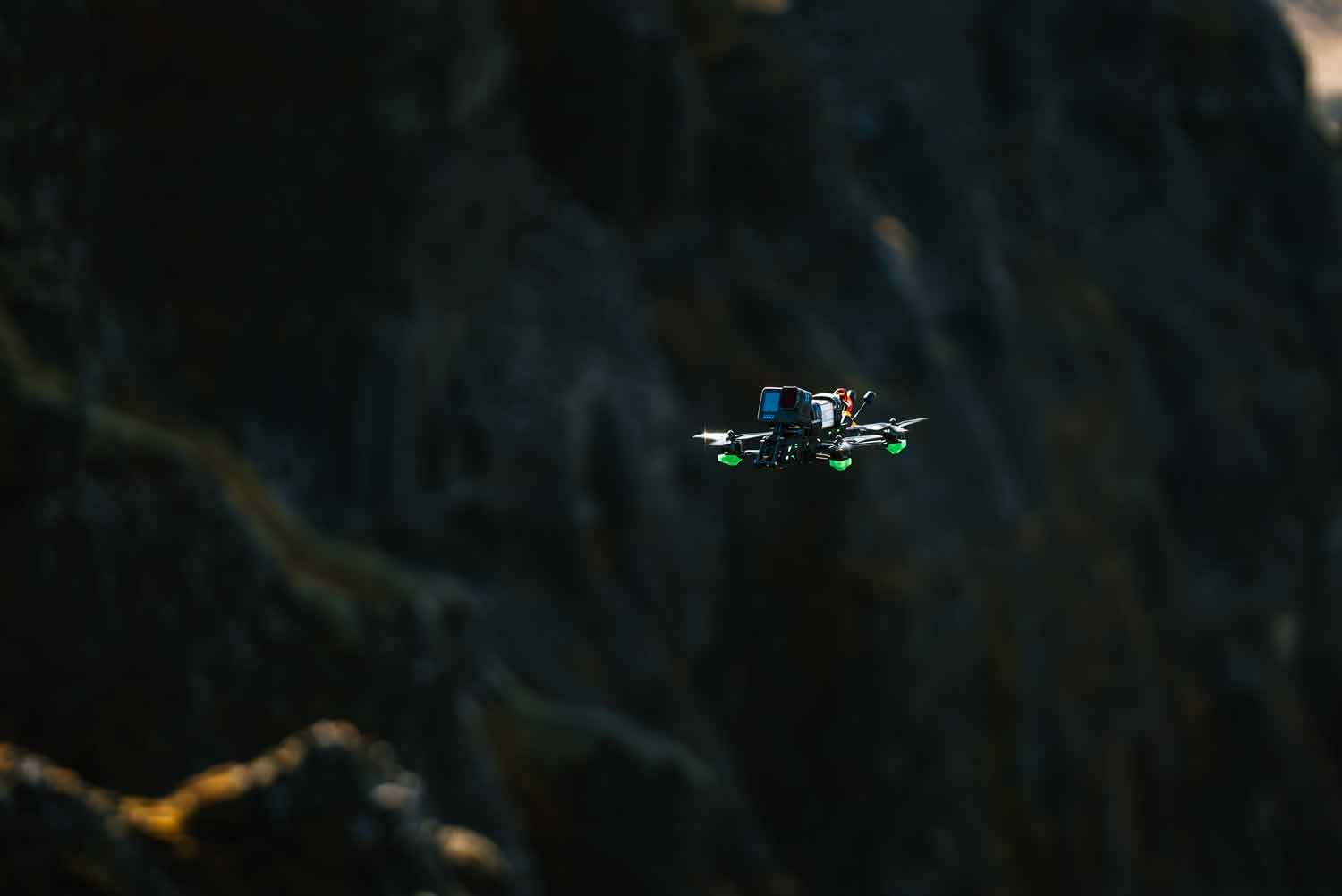 Drone capturing scenic film for strategic film production campaign ads.