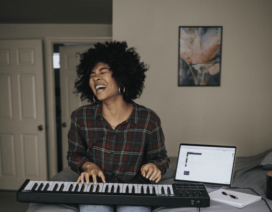 girl playing piano