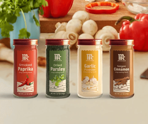 Redesigned McCormick spice bottles on a kitchen countertop.