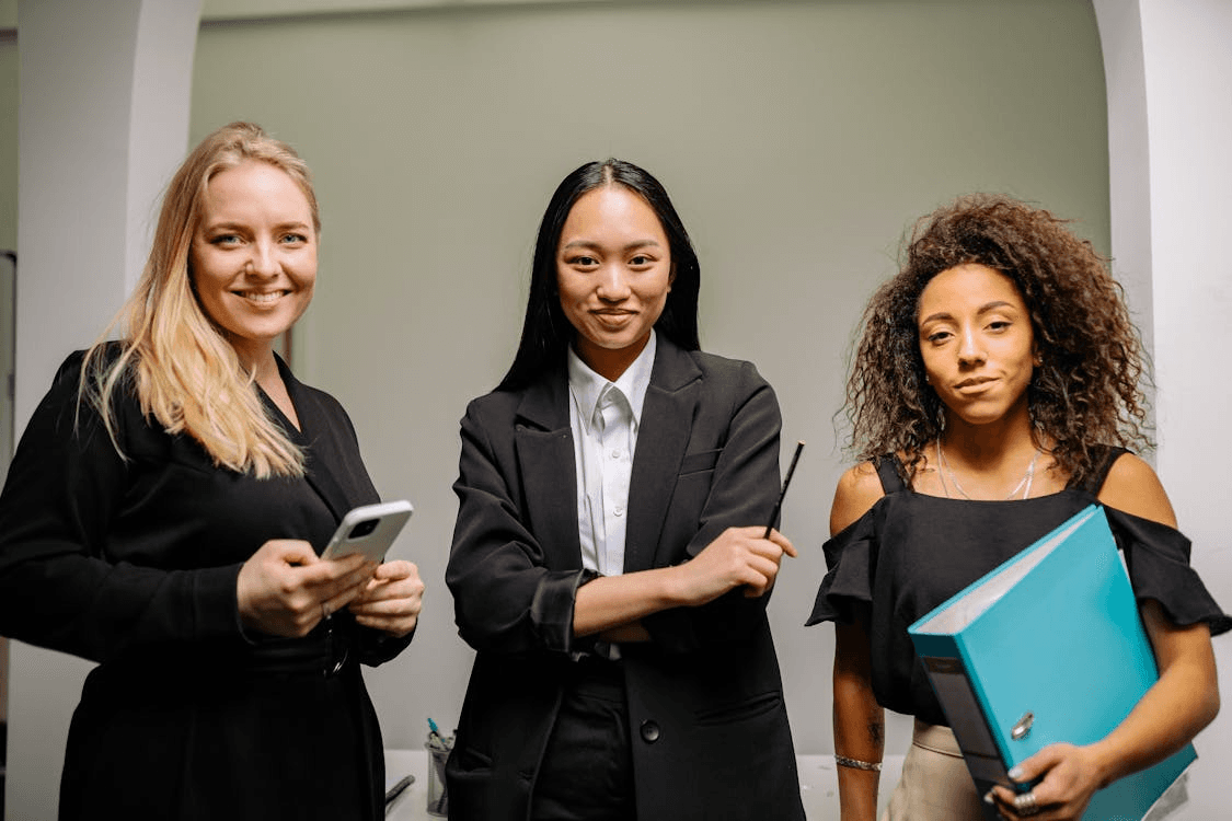 A group of corporate ladies smiling