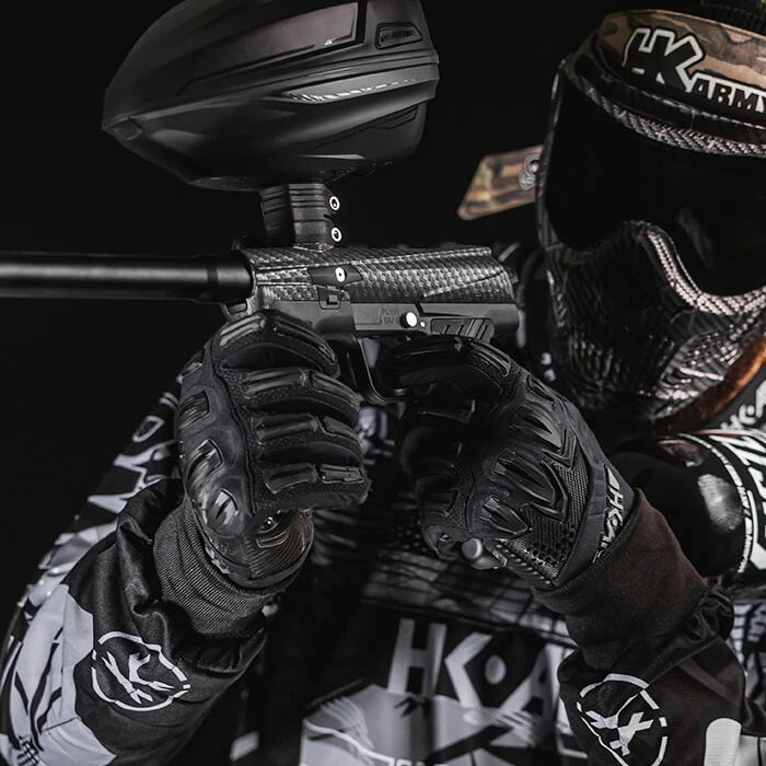 Paintball players with equipment