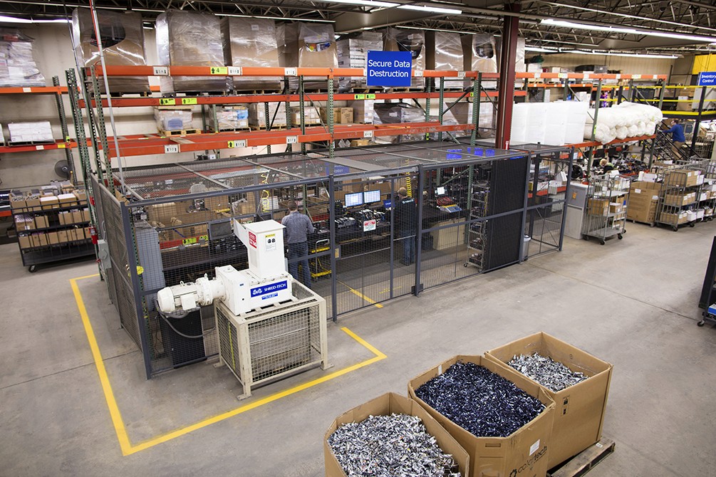 person writing on a piece of paper 