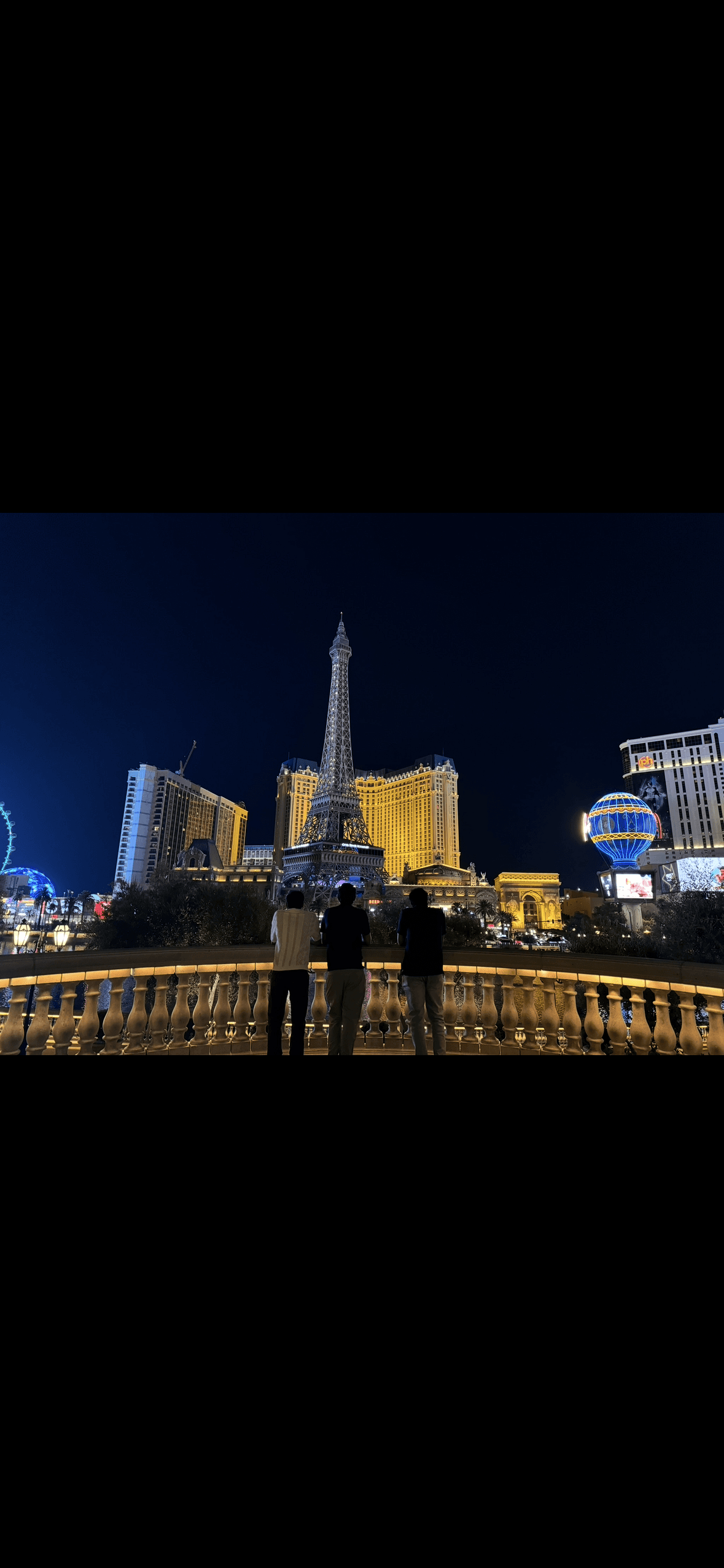 Two women preparing food in a kitchen.