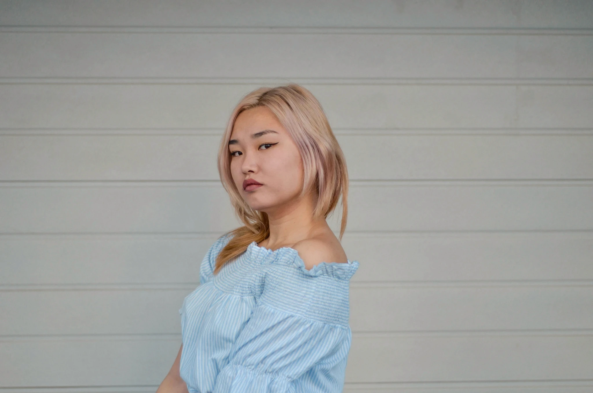 Woman wearing light blue shirt