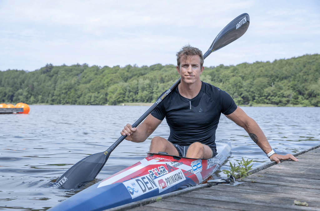a laptop computer sitting on top of a desk