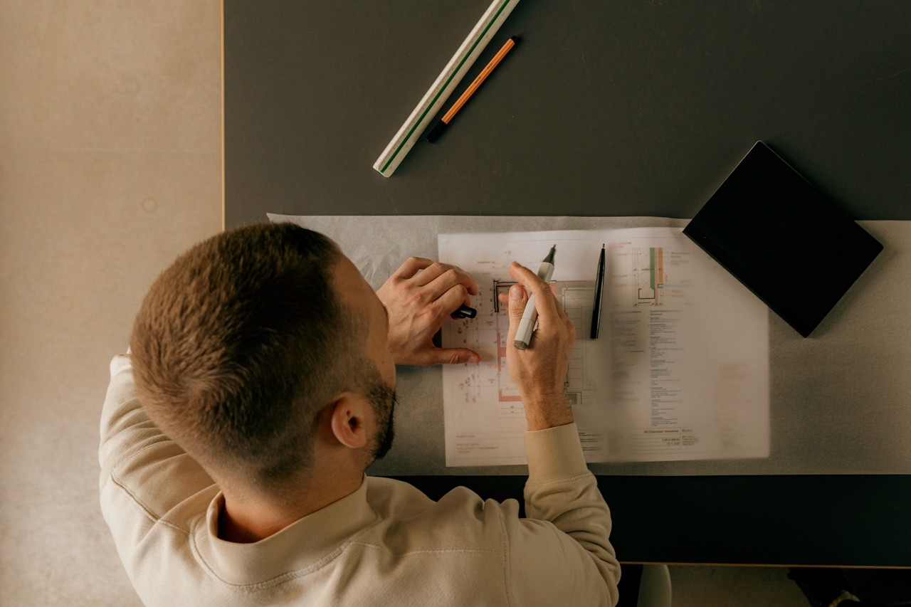 Man Studing on his Desk