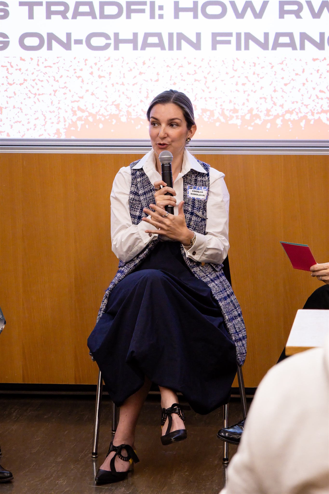 Panel speaker discussing ideas during EthereumZüri conference in Zurich