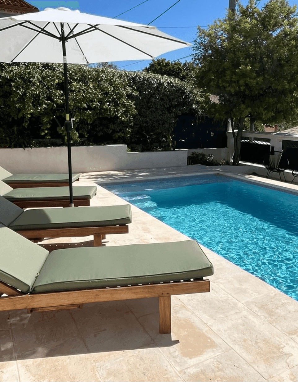 Private sea-view pool with loungers and parasol at Villa Mauricette, Toulon