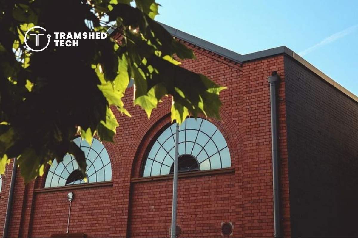 A brick building with a large window.