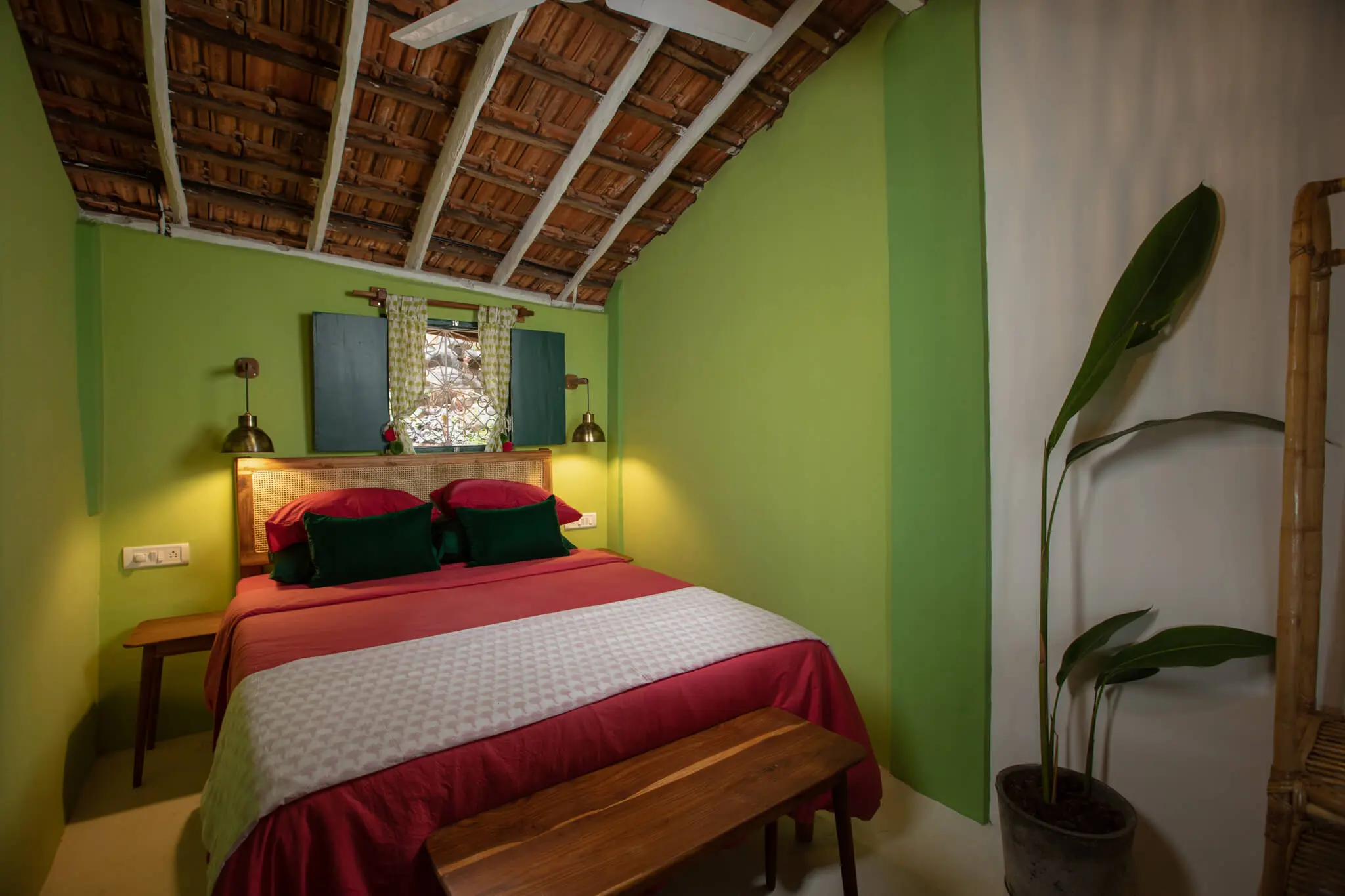 Sea View Family Room at Casa Jaali — bed beneath a thatched roof