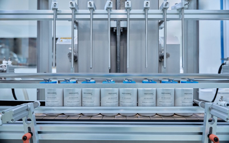 Bottles ready to be filled with skincare production line