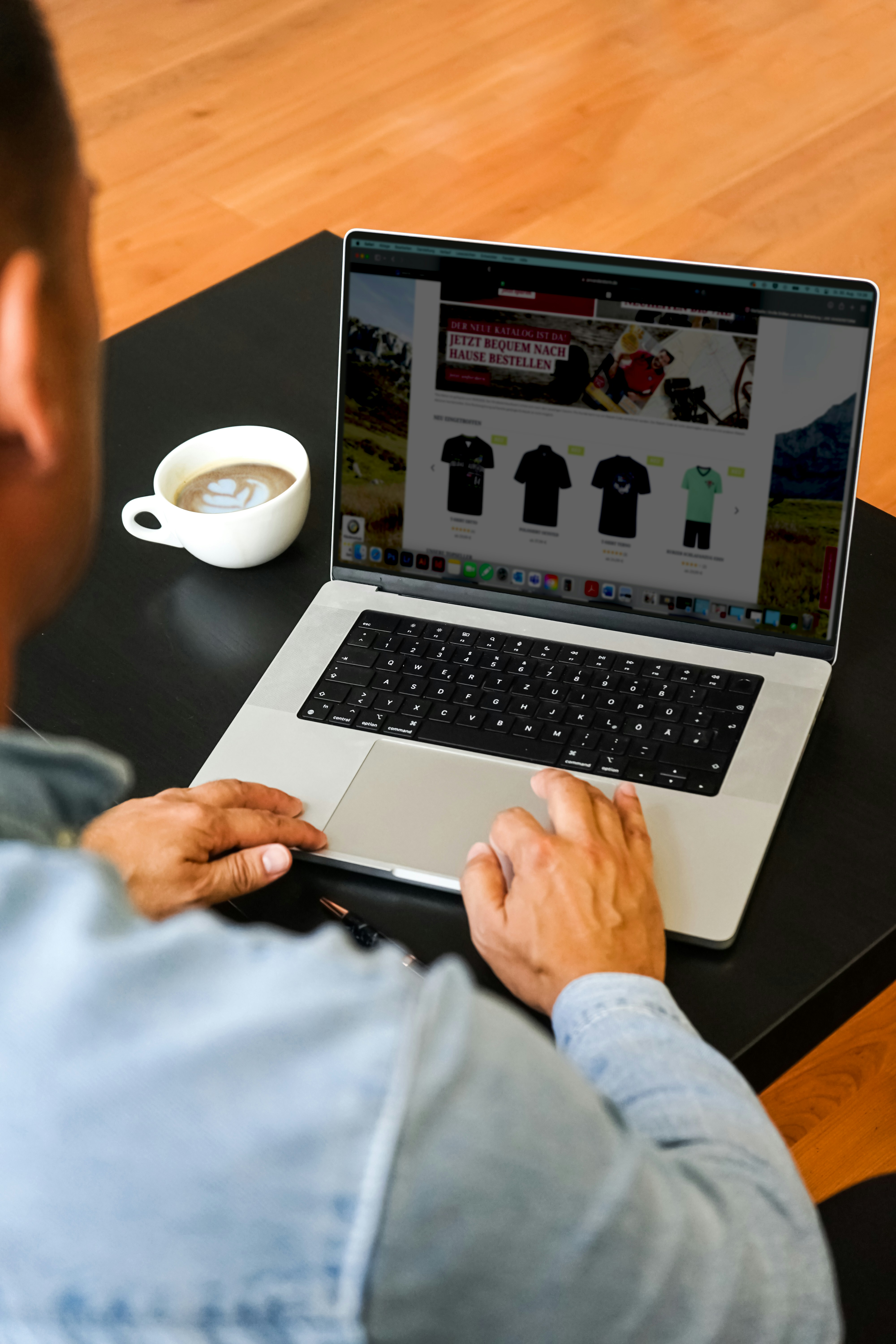 Man browsing products and shopping online on his laptop.