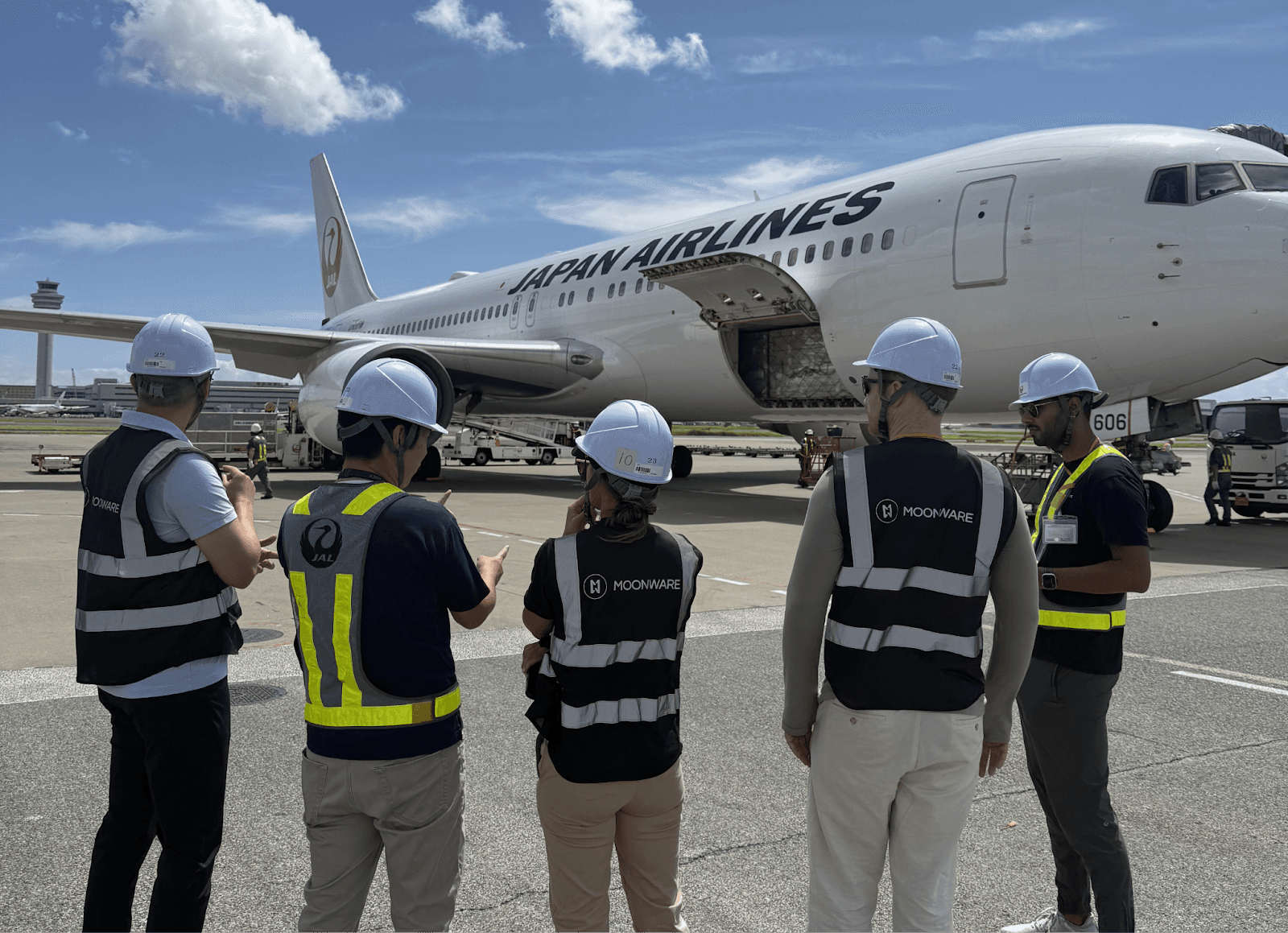 Moonware team on the airfield during a HALO deployment, supporting live ground operations.