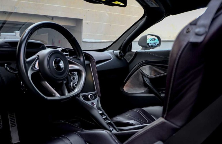 a close up of a steering wheel in a vehicle