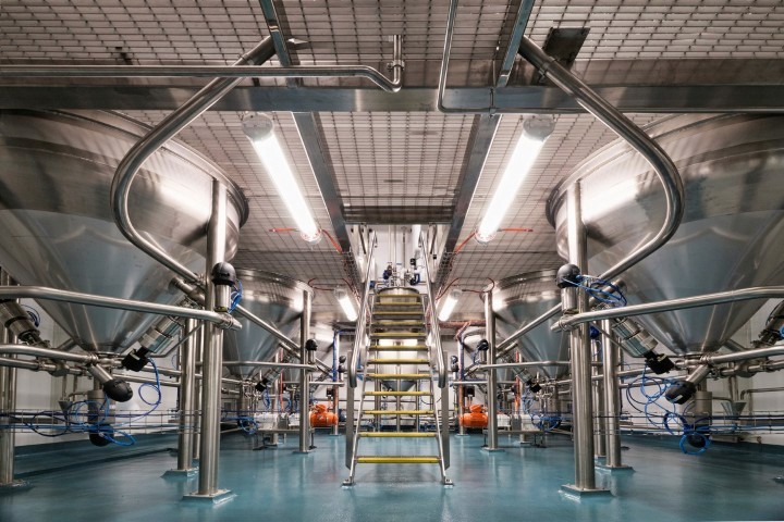 Geometric wooden wall panels with angled shapes and warm highlights.