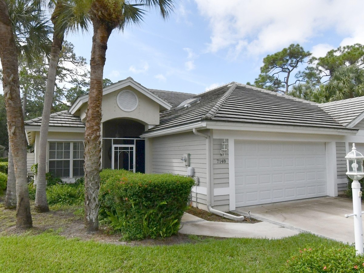 2016 Roof Replacement in Hawks View, PGA Village, Port St Lucie with Entegra Flat Smooth Tile in Natural Gray