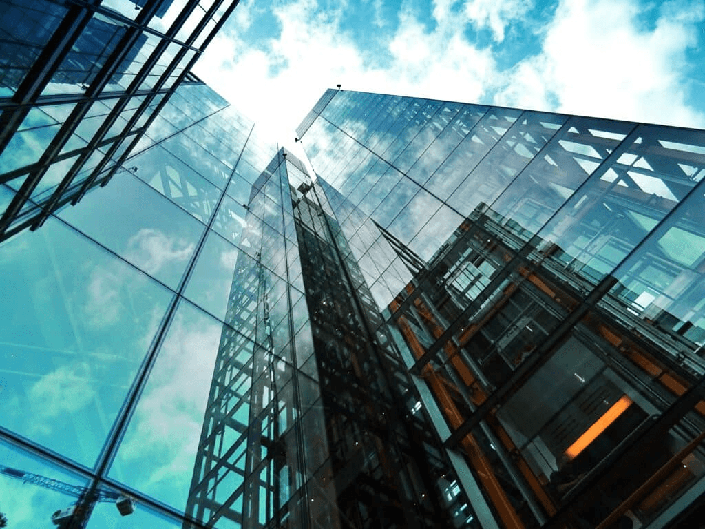 Close-up of a modern industrial building facade with sleek solar-ready panels.