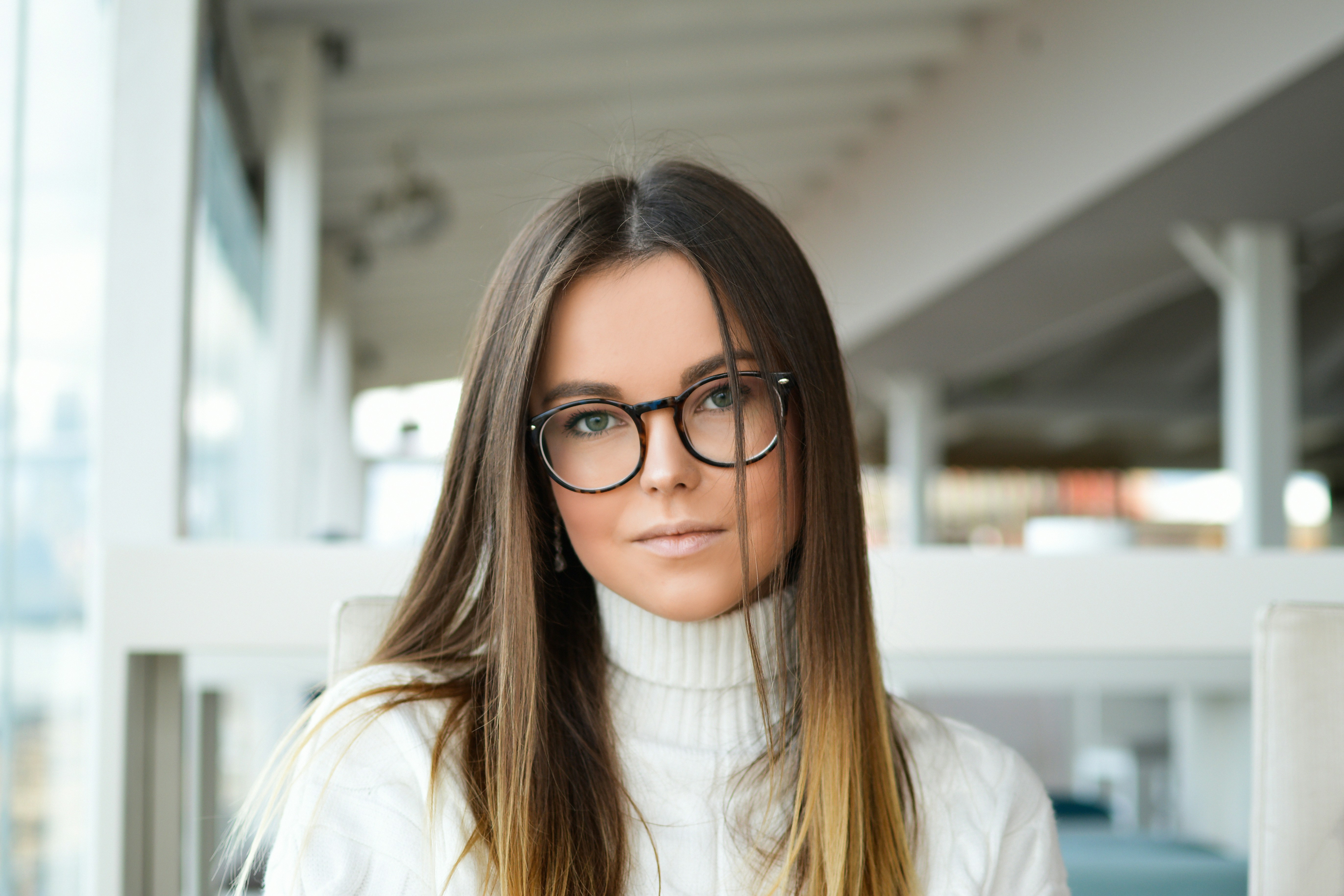 woman in glasses - Best Colors for Warm Undertones