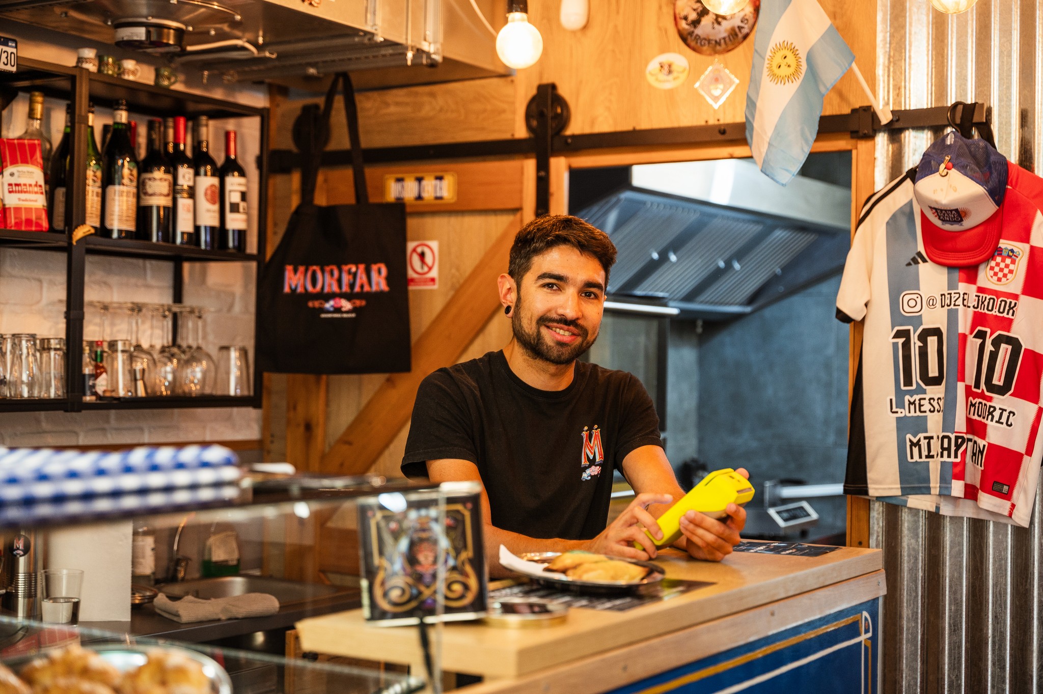 business man with credit card machine in hands