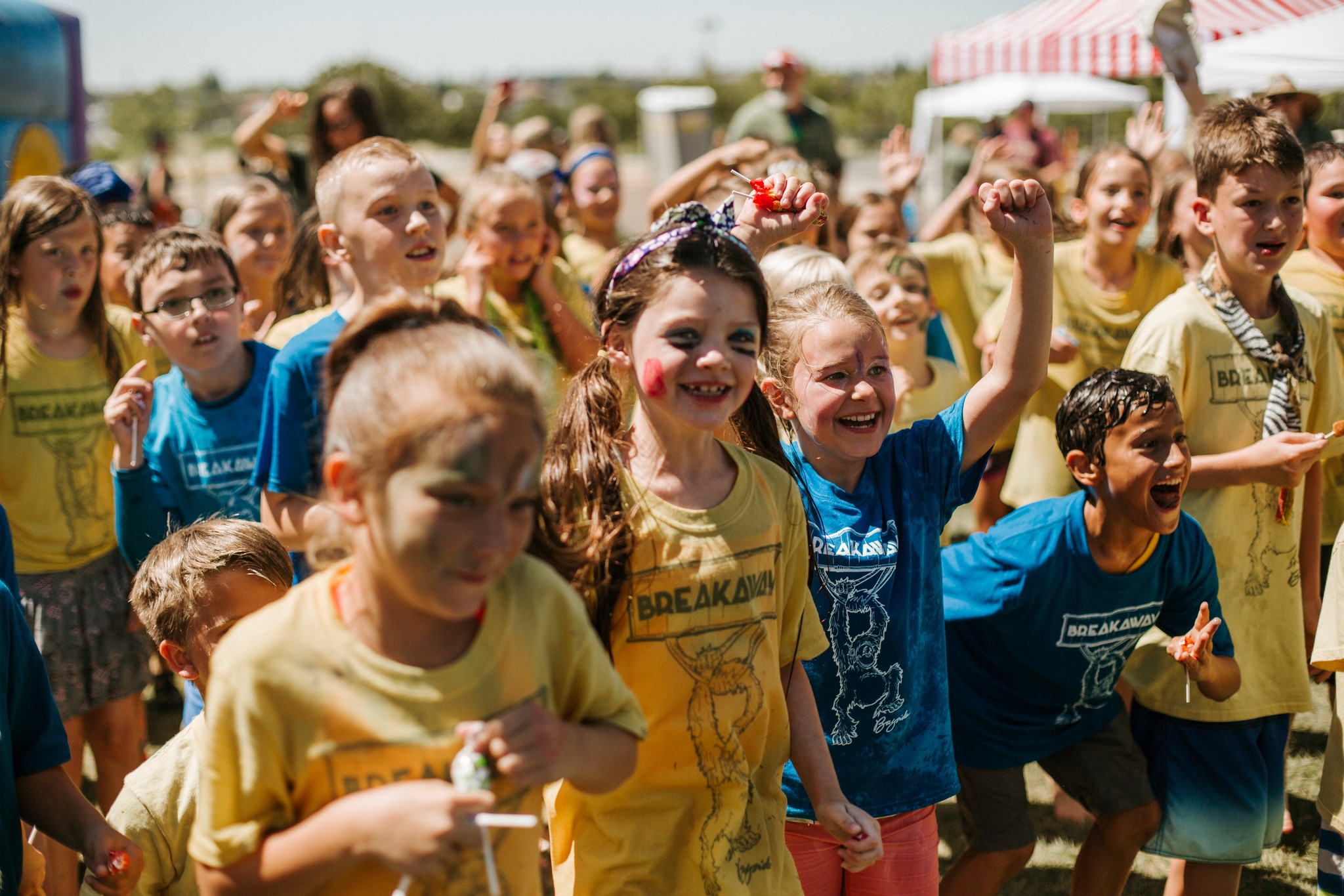 husband and wife working happily on a laptop