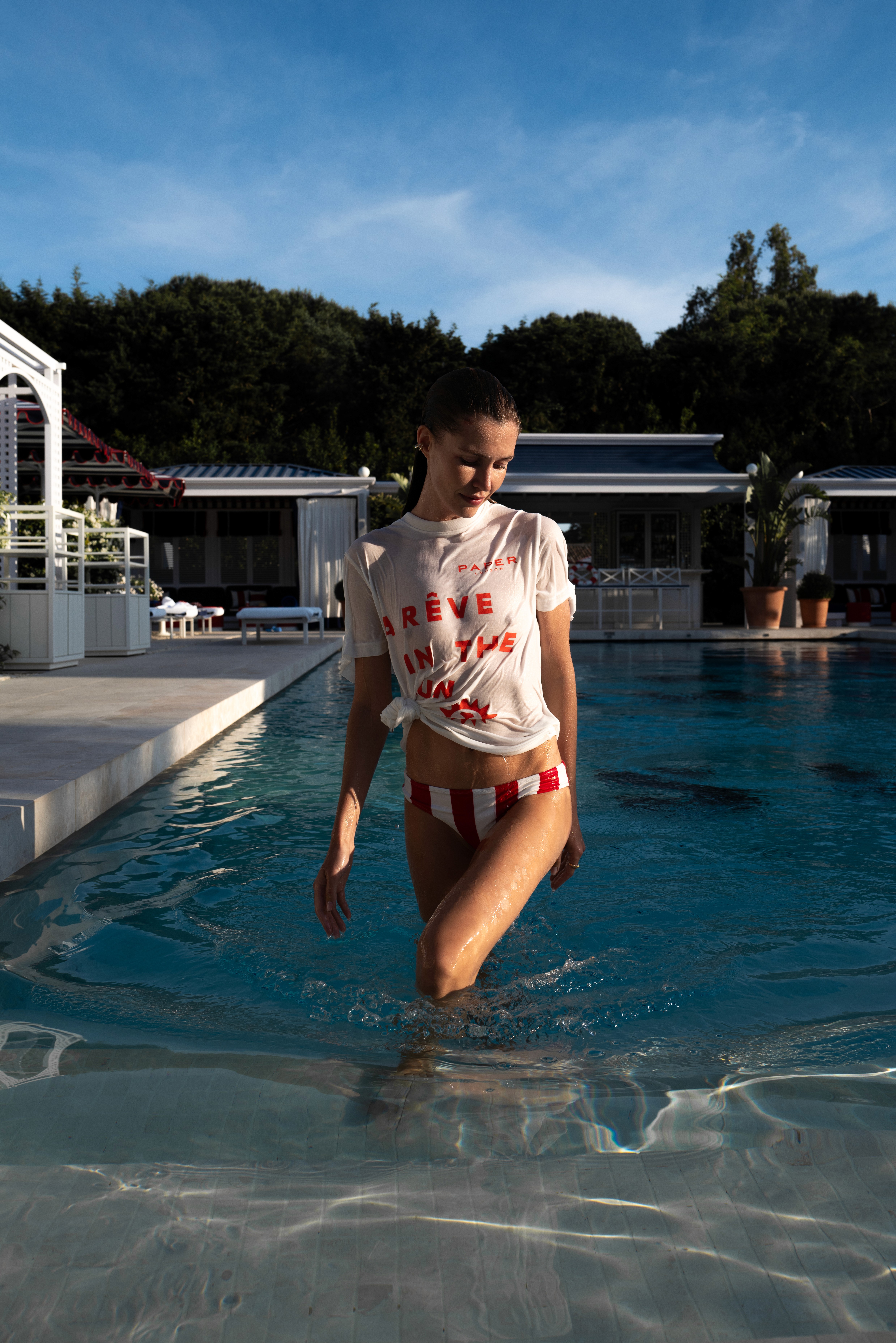 Close-up of bride and groom's torsos, bride in white dress