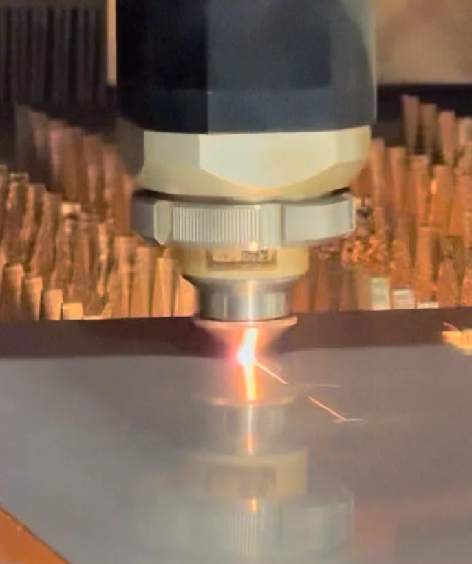 Precision cut steel being cut with CNC Fiber Laser at TratFab in Star Idaho.