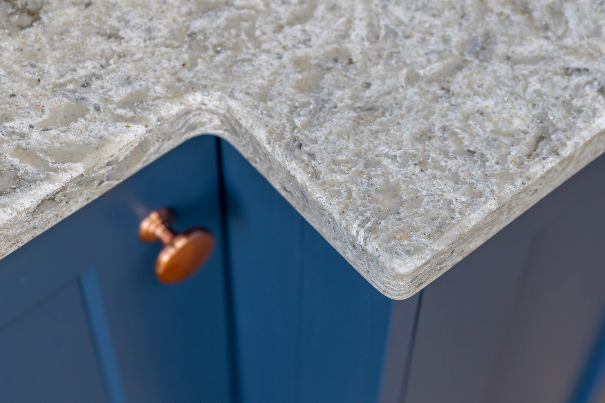 quartz worktop on blue shaker kitchen