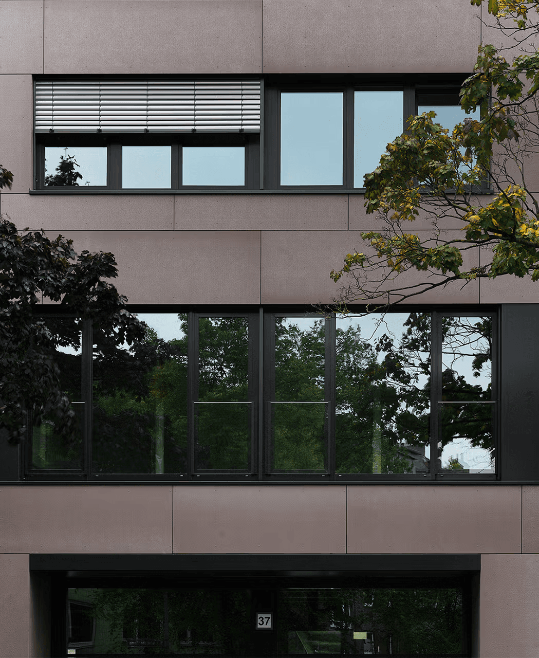 concrete skin, large format GFRC facade panels by Rieder