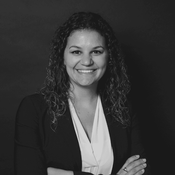 A professional headshot of a woman