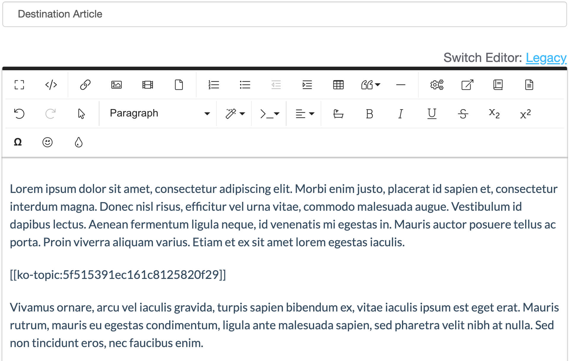 Screenshot of KnowledgeOwl WYSIWYG interface, showing a topic article reference code positioned between two paragraphs of text.