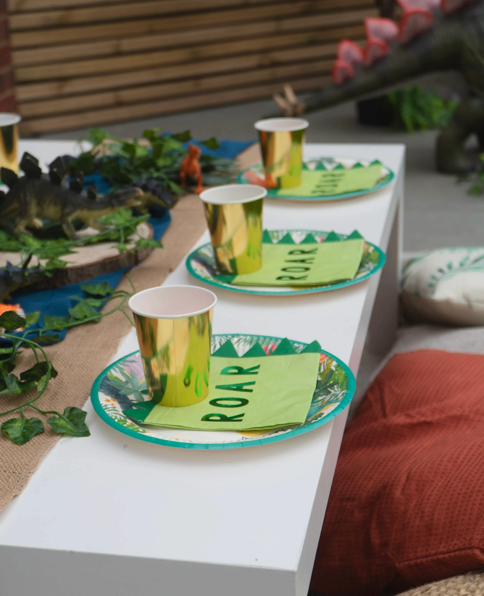 Table decoration for a dinosaur theme party