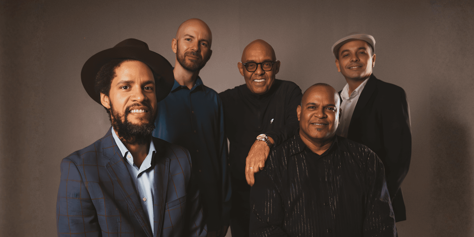 The Tumbao Experience ensemble with musicians celebrating Nina Simone's legacy through Afro-Cuban jazz fusion, featuring Dr. Samuel Waymon.
