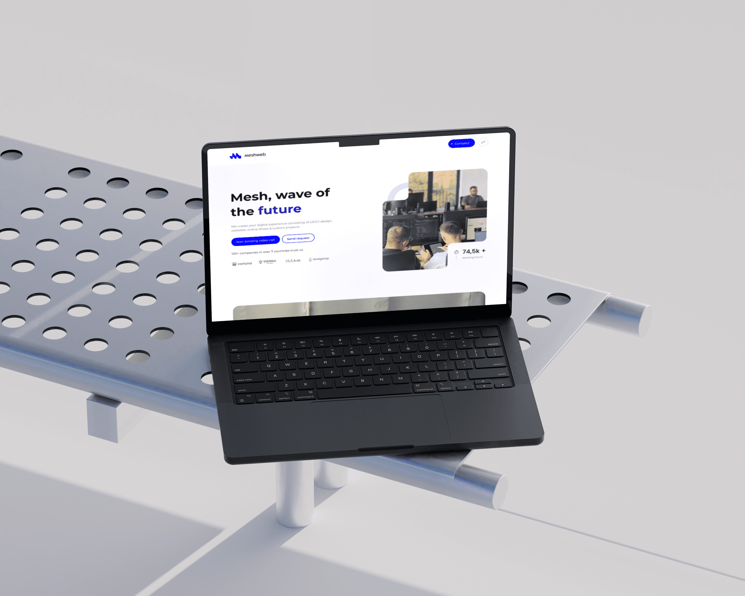 A modern black speaker illuminated by soft light, set against a green background.