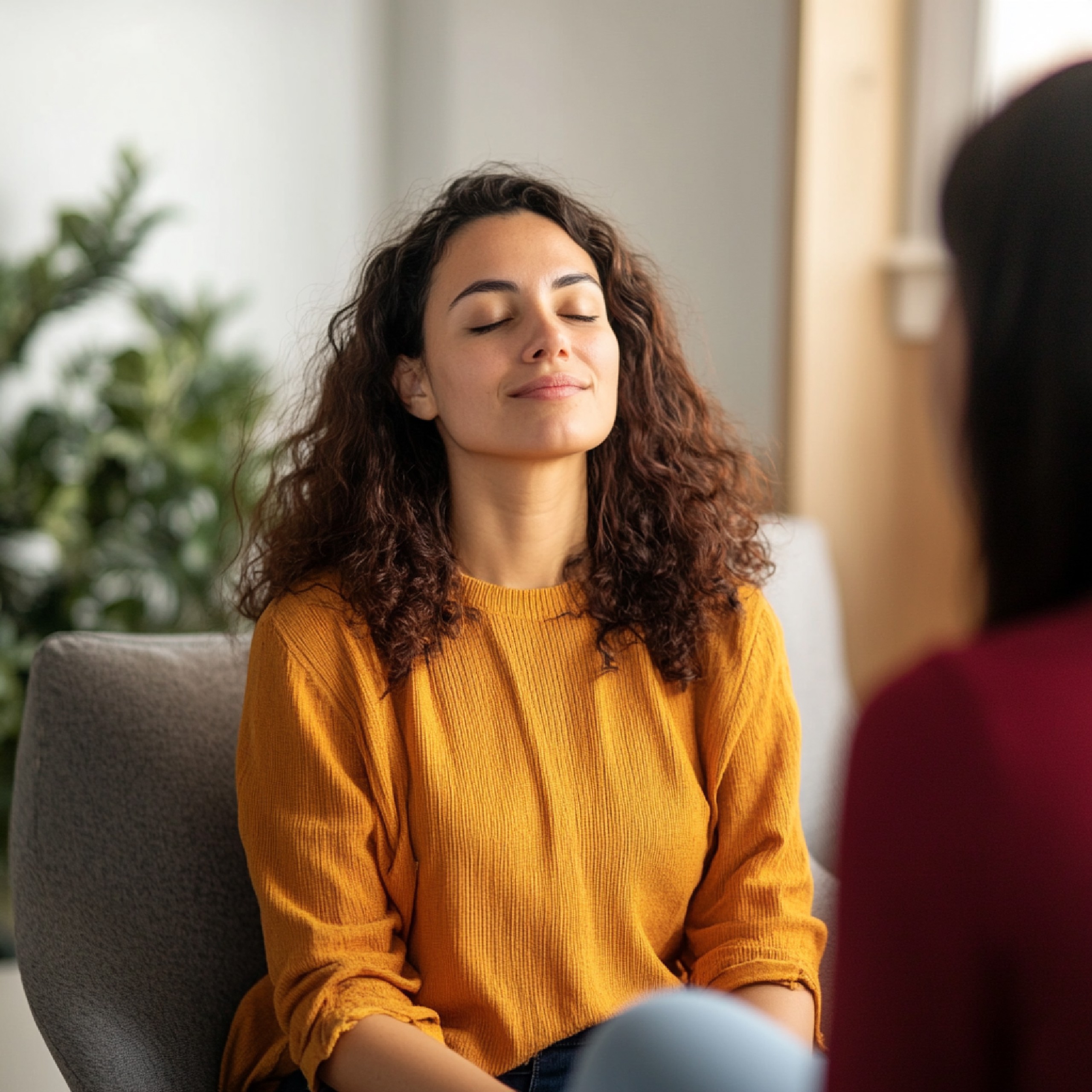 man in black nike jacket wearing white cap